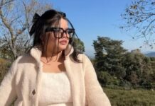 Misha Agrawal’s Story: Fame, Struggles & Tragic End Misha Agrawal in a white winter outfit posing outdoors with trees and blue sky in the background